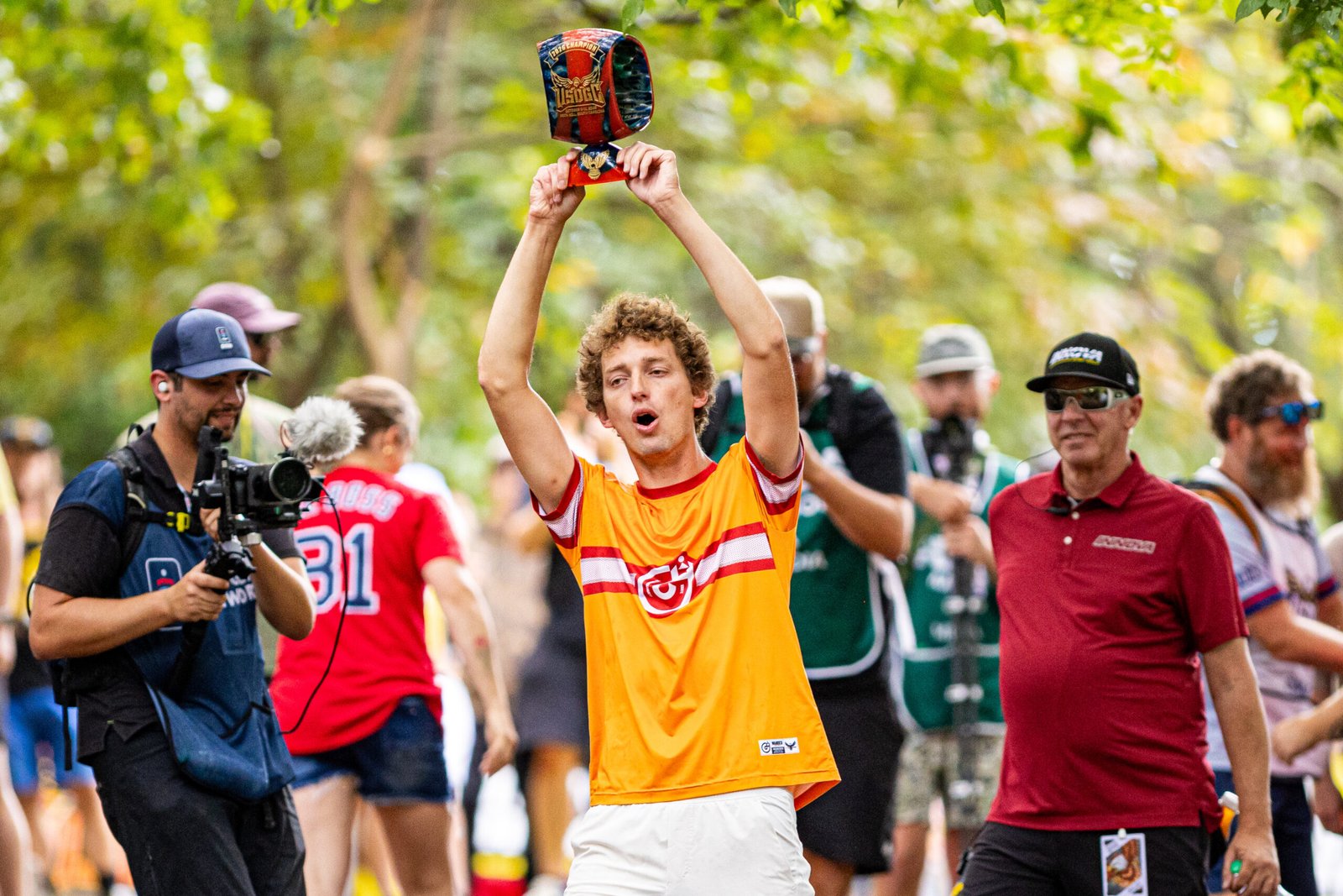 Calvin Heimburg raises the trophy after winning the 2026 USDGC
